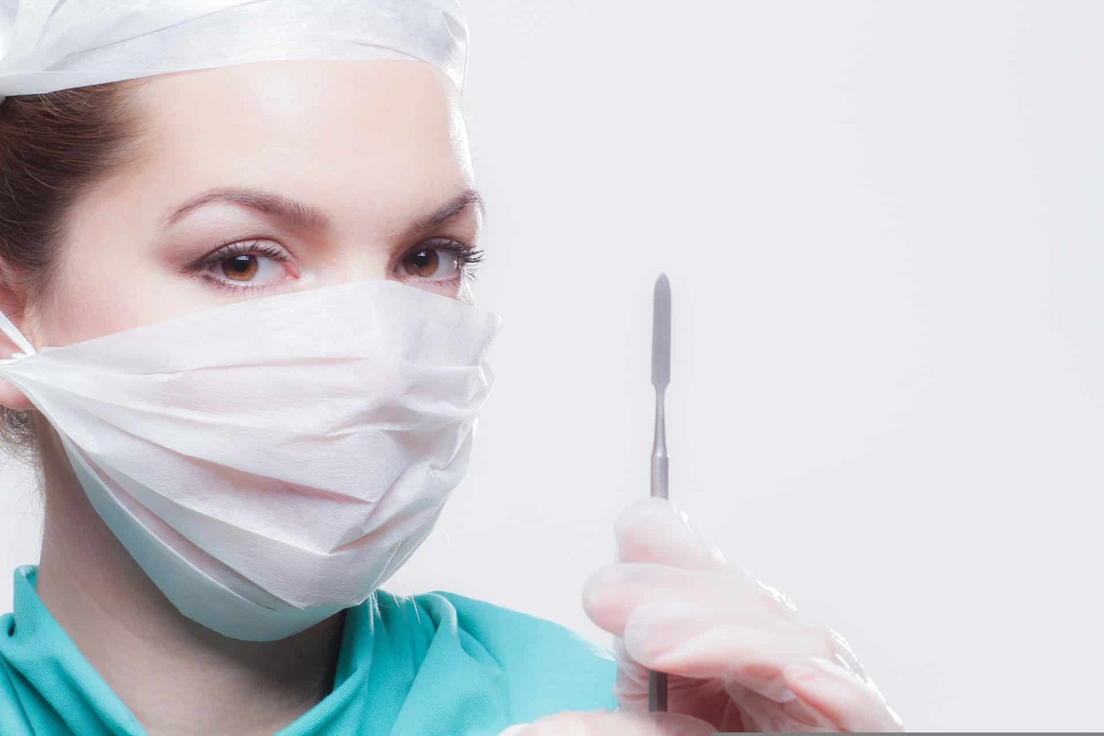 Doctor With Surgical Instrument