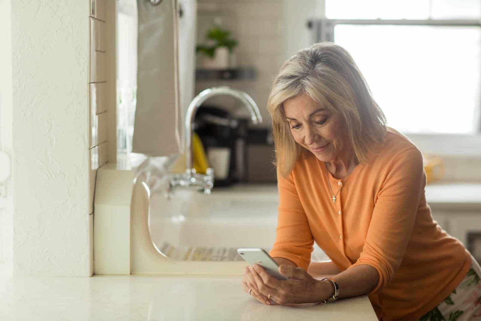 A woman talking to her doctor over the phone
